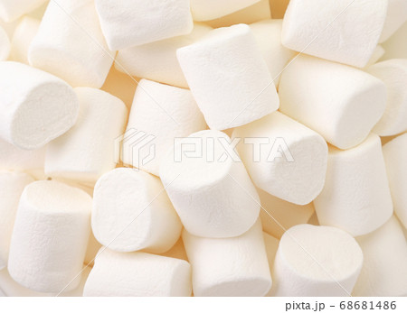 Chewing marshmallow white, background. The view 68681486