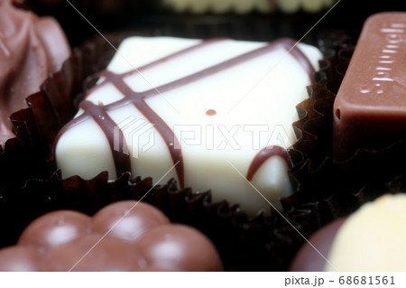 Box with chocolate candies Box with chocolate candies 68681561