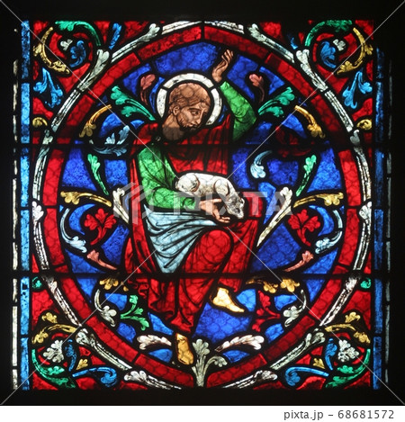 Colorful stained glass window in Notre Dame Cathedral in Paris Colorful stained glass window in Notre Dame Cathedral in Paris 68681572