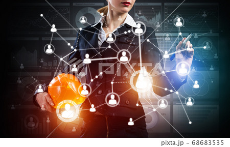 Businesswoman pointing on abstract 3d network Businesswoman pointing on abstract 3d network 68683535