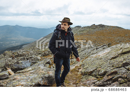 handsome bearded hiker got lost in mountains 68686463
