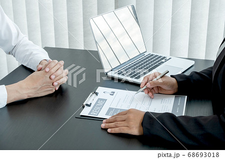 Business people hold a job profile and talk to job applicants for job interviews about careers 68693018