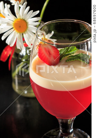 Cherry and milk jelly with strawberry piece in the Cherry and milk jelly with strawberry piece in the 68697600