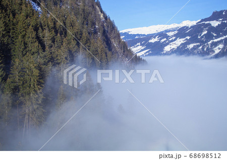 The river of white fog in mountains.Alpine Alps 68698512
