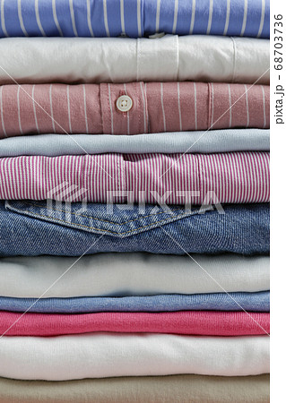 Clean garment neatly folded after laundry over Clean garment neatly folded after laundry over 68703736