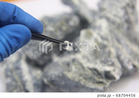 Chrysotile asbestos fiber close up. 68704456