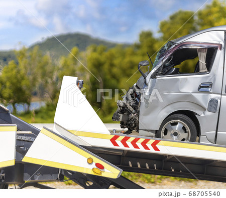 accident Car Slide on truck for move. van car have accident Car Slide on truck for move. van car have 68705540