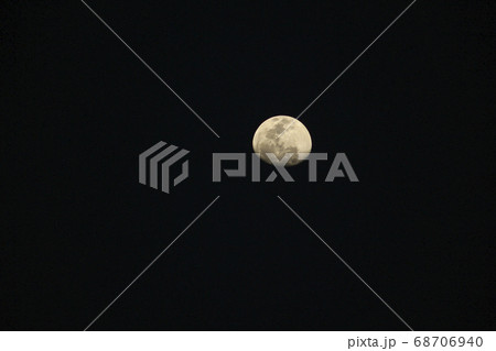 Background moon on a dark sky. Background moon on a dark sky. 68706940