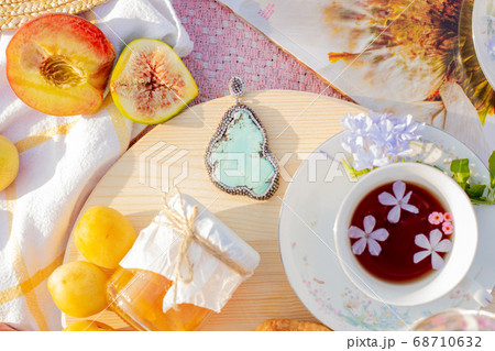 A picnic at dawn in gentle colors. 68710632