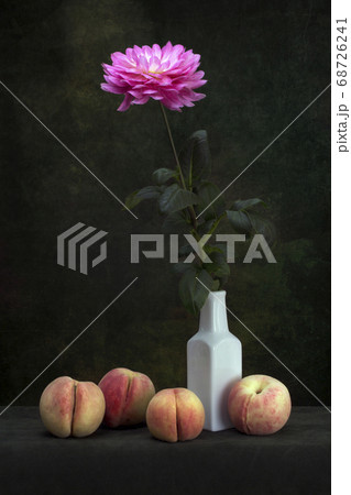 Still life with peaches and dahlia flower 68726241