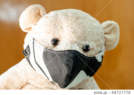 Cute Teddy bear wearing a mask - Focus on the mask Cute Teddy bear wearing a mask - Focus on the mask 68727776