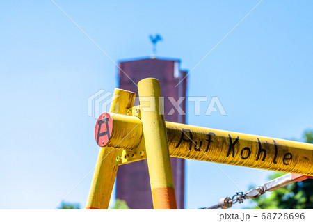 Tower with cock and playground construction in the foreground- translation: on coal Tower with cock and playground construction in the foreground- translation: on coal 68728696