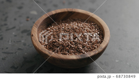 flaxseed in olive bowl on terrazzo countertop with copy space flaxseed in olive bowl on terrazzo countertop with copy space 68730849
