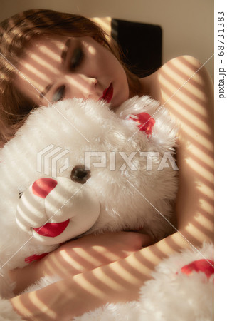 woman with teddy bear woman with teddy bear 68731383