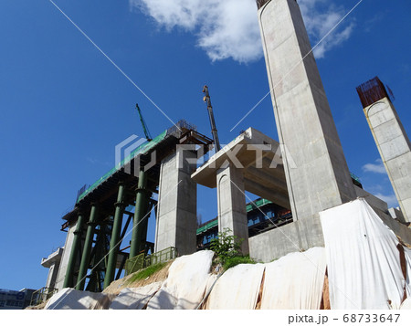 SEREMBAN, MALAYSIA -MARCH 7, 2020: Steel reinforced concrete column under construction. Reinforcement bar on top of column ready for the next stage of construction. 68733647