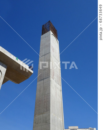 SEREMBAN, MALAYSIA -MARCH 7, 2020: Steel reinforced concrete column under construction. Reinforcement bar on top of column ready for the next stage of construction. 68733649