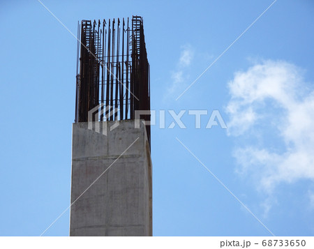 SEREMBAN, MALAYSIA -MARCH 7, 2020: Steel reinforced concrete column under construction. Reinforcement bar on top of column ready for the next stage of construction. 68733650
