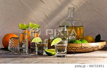 tequila and citrus fruits tequila and citrus fruits 68733951