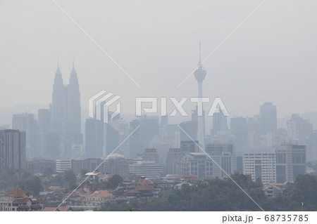 Hazy Kuala Lumpur city skyscape due to haze from Hazy Kuala Lumpur city skyscape due to haze from 68735785