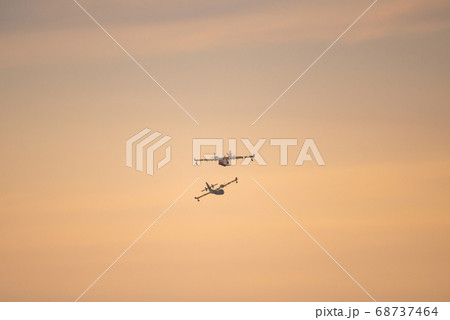 Amphibious water bomber in flight 68737464