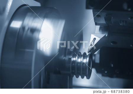 The  CNC lathe machine groove cutting . 68738380