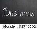 Chalk business word text on black background. 68740202