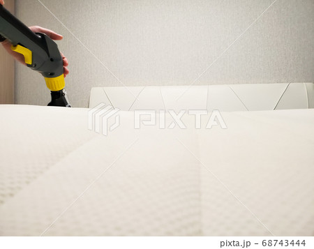 cleaning company cleans the mattress. General cleaning of the mattress 68743444