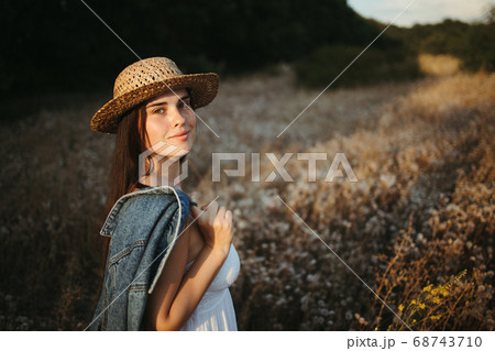 Happy carefree woman enjoy her vacation in nature Happy carefree woman enjoy her vacation in nature 68743710