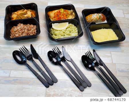 Containers with useful food on an isolated background. Delivery service 68744170