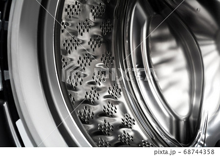 Washing machine drum inside view. Washing machine drum inside view. 68744358