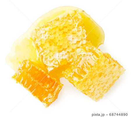 Honeycomb on a white background, isolated. The Honeycomb on a white background, isolated. The 68744890