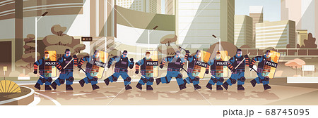 policemen with shields and batons riot police officers standing together protesters demonstrations control policemen with shields and batons riot police officers standing together protesters demonstrations control 68745095
