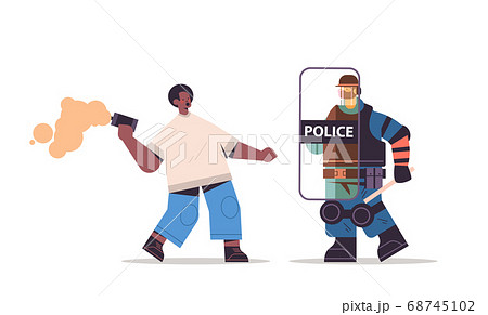 riot police officer attacking protester with smoke bomb during clashes demonstration protest control 68745102