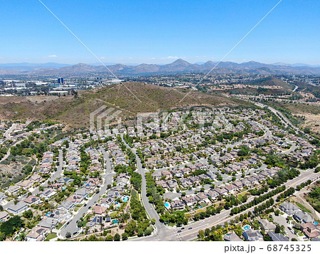 Aerial view of suburban neighborhood with big mansions in San Diego 68745325