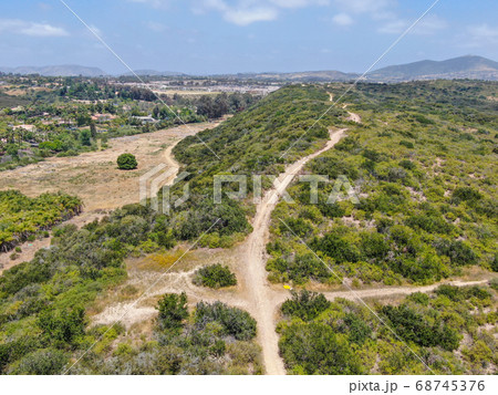 Aerial view of of small dry rocky trails in the mountain. 68745376