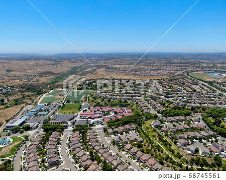 Aerial view of suburban neighborhood with big mansions in San Diego 68745561