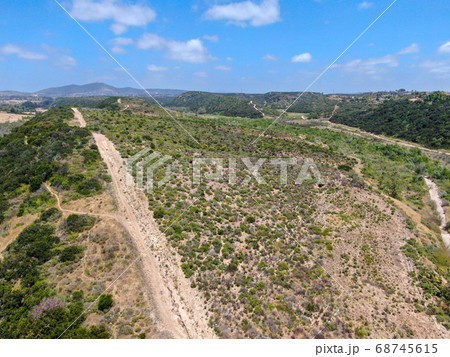 Aerial view of of small dry rocky trails in the mountain. 68745615