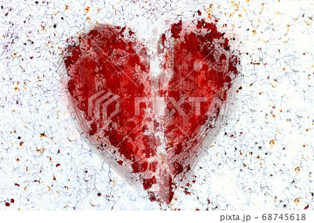 Broken heart. Red spot in the shape of a heart on white background. Broken heart. Red spot in the shape of a heart on white background. 68745618