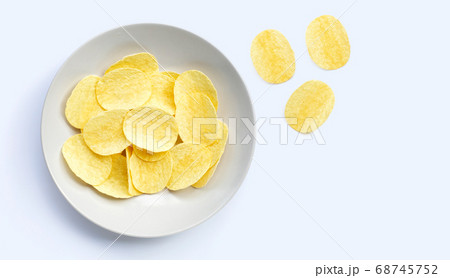Potato chips on white background. Potato chips on white background. 68745752