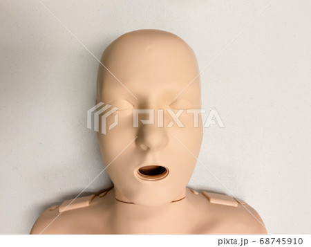 CPR dummy on white background for first aid and cardiopulmonary resuscitation training CPR dummy on white background for first aid and cardiopulmonary resuscitation training 68745910