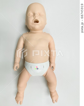 Child's doll for CPR training and child's heart massage first aid 68745919