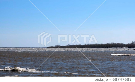Melting ice floating on the Ob River Melting ice floating on the Ob River 68747685