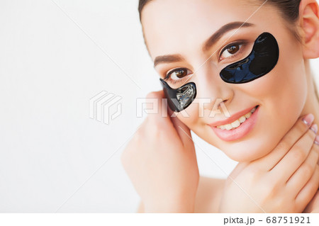 Skin Care Mask. Woman With Black Patches. 68751921