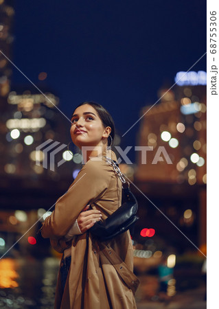 woman walking near Chicago river woman walking near Chicago river 68755306