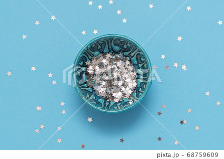 Top view of blue bowl with star glitter. Magic concept. Top view 68759609