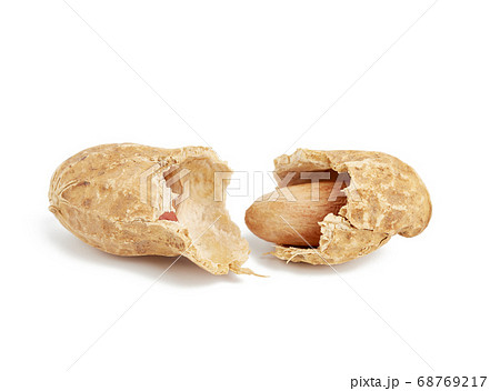inshell peanuts broken in half, food isolated on inshell peanuts broken in half, food isolated on 68769217