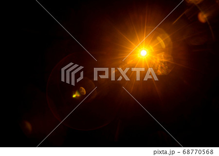 Abstract Natural Sun flare on the black Abstract Natural Sun flare on the black 68770568