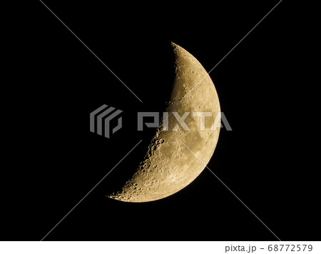half moon in the dark sky 68772579
