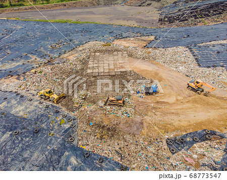 Aerial top view photo from flying drone of large garbage pile. Garbage pile in trash dump or landfill. Environmental pollution 68773547