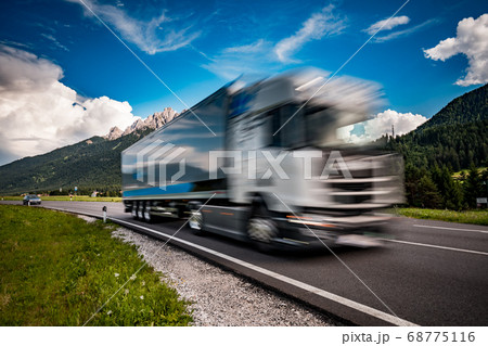Fuel truck rushes down the highway in the Fuel truck rushes down the highway in the 68775116